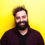 happy-smiling-bearded-hipster-man-on-yellow-backgr-2021-08-26-15-25-17-utc@2x.png